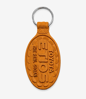 KKM-p04-01-die-moulding-pvc-keychain Orange PVC keychain on a metal split ring