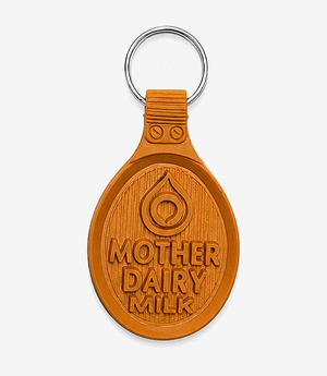 KKM-p04-06-die-moulding-pvc-keychain Orange PVC keychain on a metal split ring