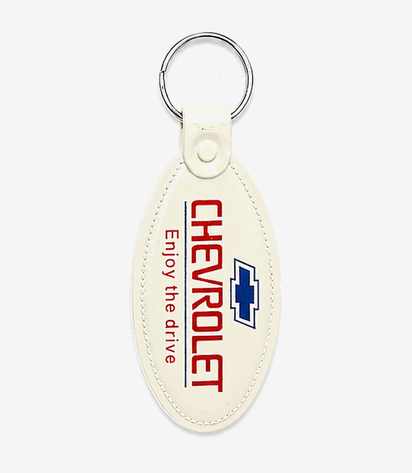 White ABS keychain on a metal split ring