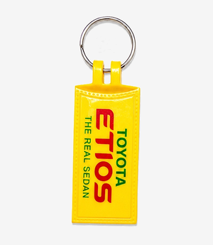 Yellow ABS keychain on a metal split ring