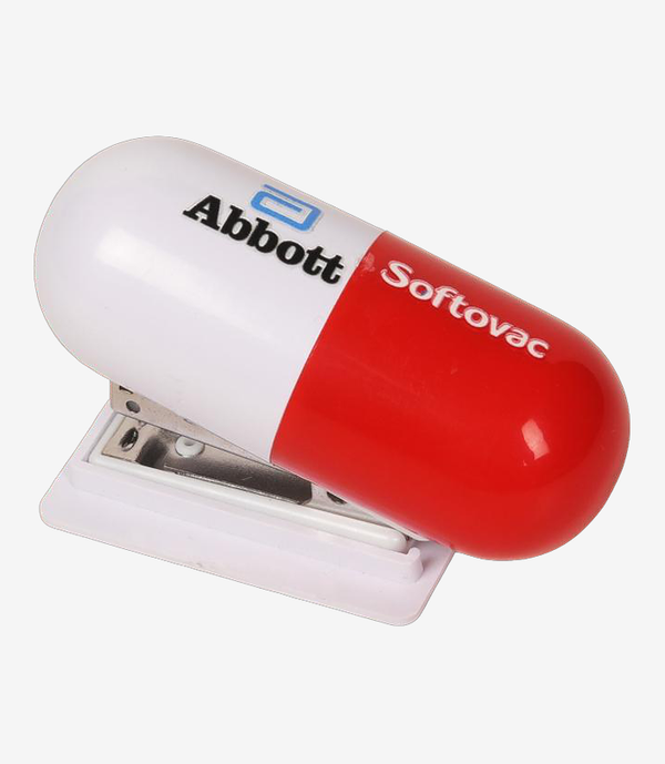 White plastic paper weight