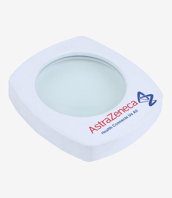 White plastic paper weight