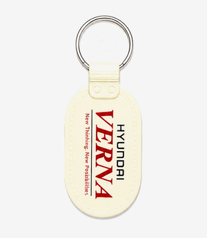 White ABS keychain on a metal split ring