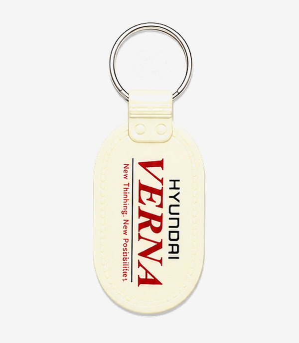 White ABS keychain on a metal split ring