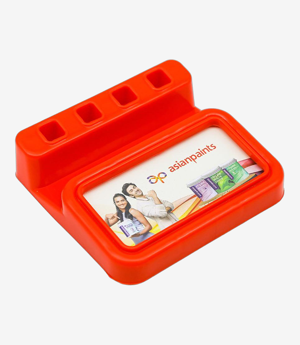 Red plastic paper weight