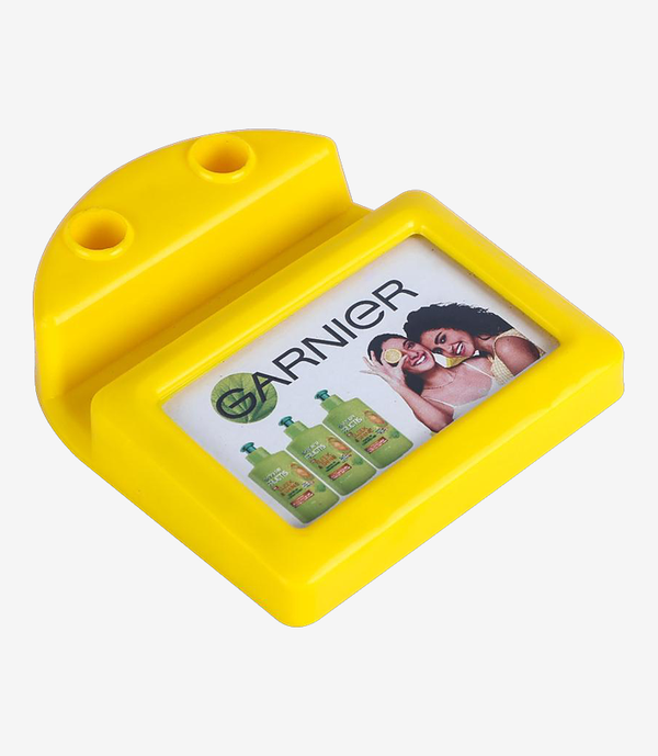 Yellow plastic paper weight