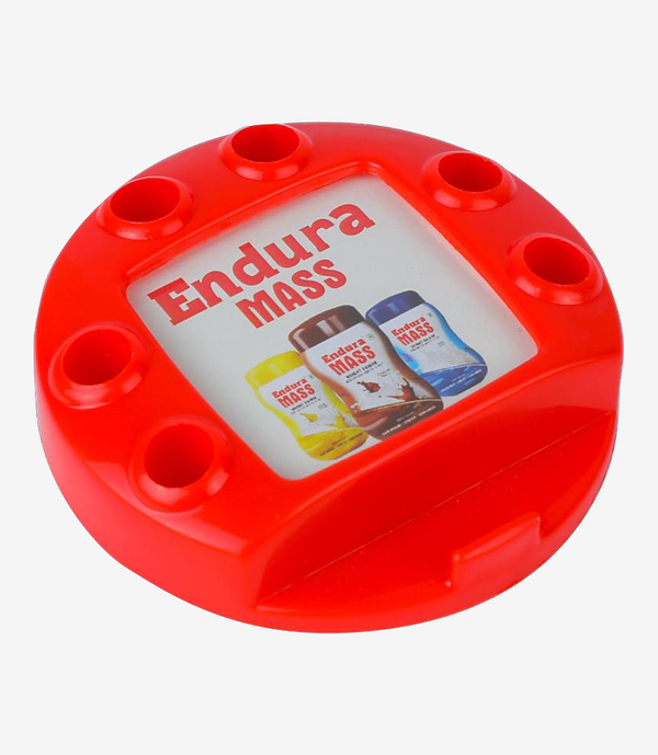 Red plastic paper weight