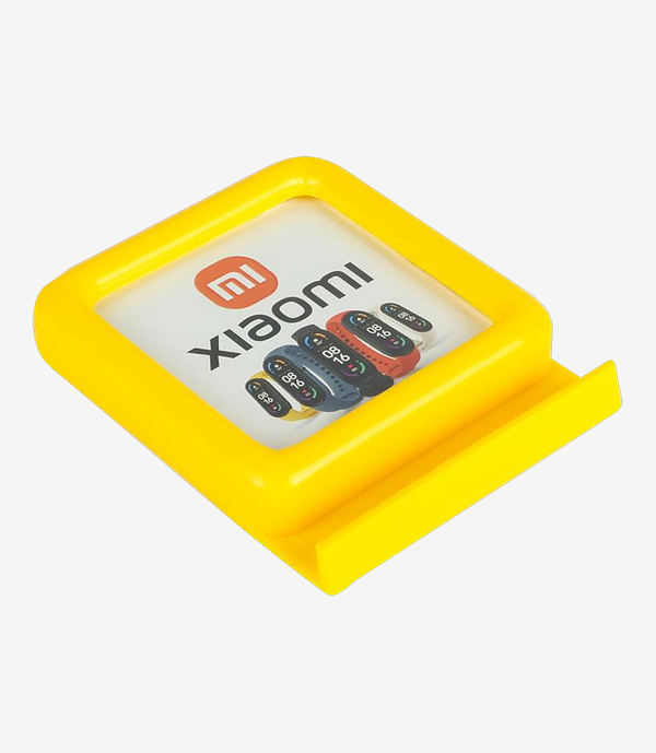 Yellow plastic paper weight