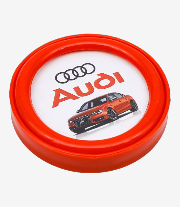 Red plastic paper weight