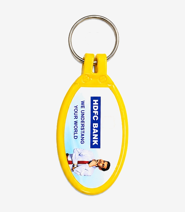 Yellow ABS keychain on a metal split ring