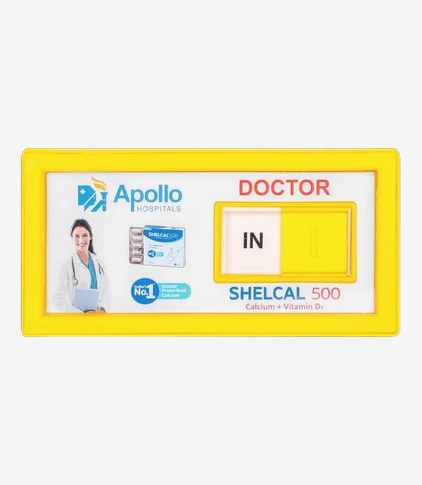 Yellow doctor in and out desk sign