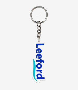 KKM-p21-01-silicon-keychain-embossed-single-side Blue silicone keychain on a metal split ring