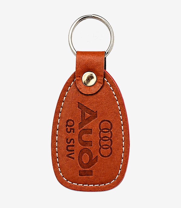 KKM-p31-04-leather-imported-rexine-keychain Tan leather keychain on a metal split ring