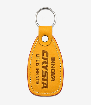 Tan leather keychain on a metal split ring