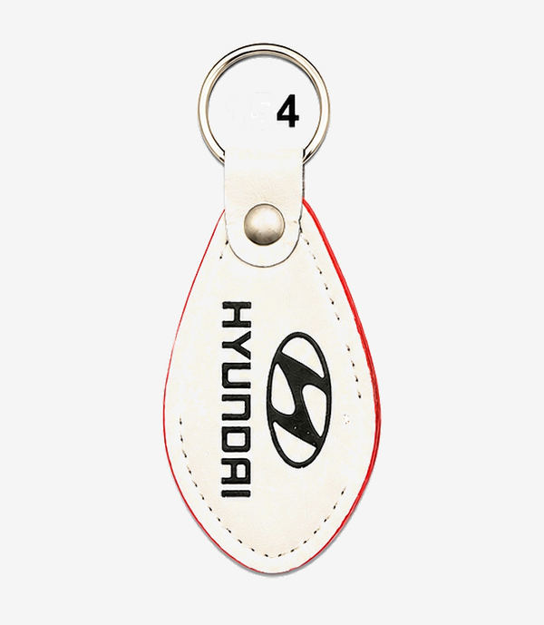 KKM-p33-04-leather-imported-rexine-keychain Grey leather keychain on a metal split ring