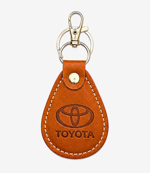 Tan leather keychain on a metal split ring