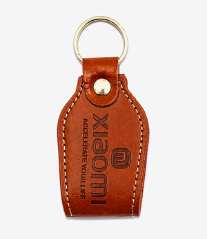Tan leather keychain on a metal split ring