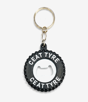 Grey bottle opener keychain on a metal split ring