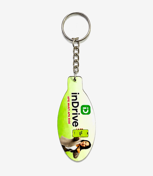 Green MDF keychain on a metal split ring