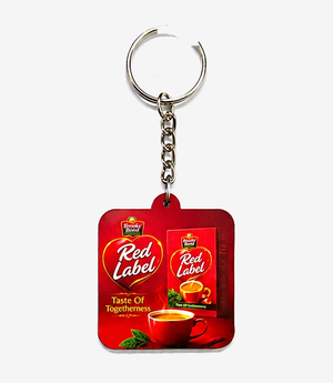 Red MDF keychain on a metal split ring