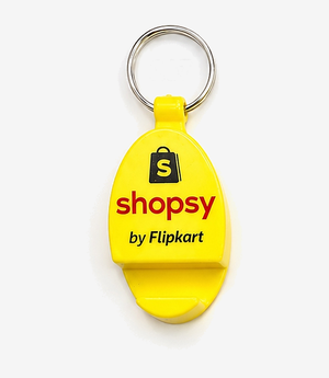 KKM-p56-01-plastic-keychain-with-mobile-stand Yellow plastic keychain with a fold-out mobile stand on a split ring