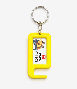 KKM-p56-03-plastic-keychain-with-mobile-stand Yellow plastic keychain with a fold-out mobile stand on a split ring