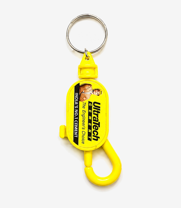 Yellow plastic hook keychain on a metal split ring